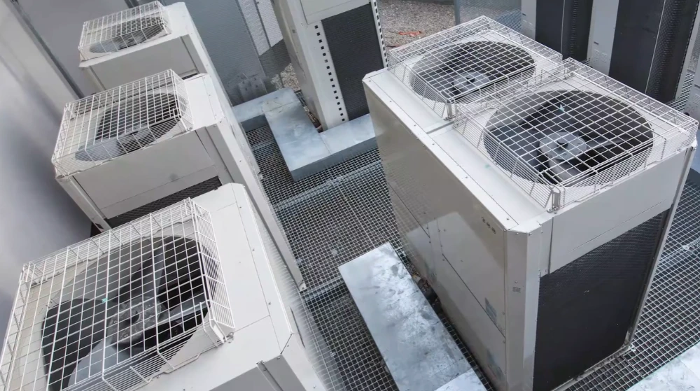 Outdoor HVAC condenser unit exposed to Florida heat and humidity